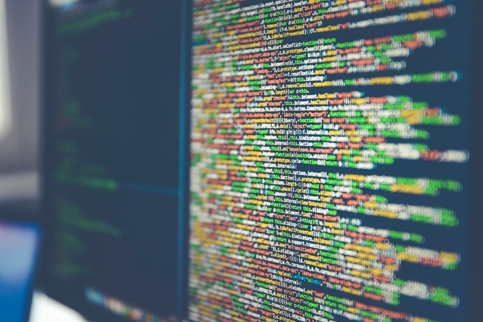 Colorful source code in a website browser mockup